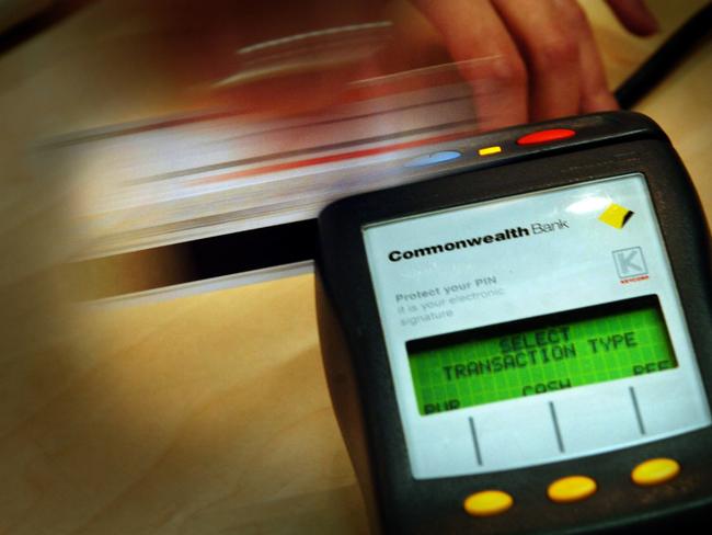 06/08/2004 PIRATE: Generic image of customer swiping a credit card through a Commonwealth Bank Eftpos machine at a shop in Sydney, 28/05/2004.