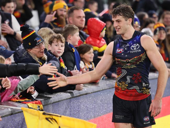 ADELAIDE, AUSTRALIA – JULY 13: Billy Dowling of the Crows celebrates their win during the 2024 AFL Round 18 match between the Adelaide Crows and the St Kilda Saints at Adelaide Oval on July 13, 2024 in Adelaide, Australia. (Photo by James Elsby/AFL Photos via Getty Images)