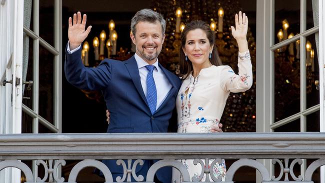 Crown Prince Frederik and Crown Princess Mary on the balcony of Amalienborg Palace square on Frederik’s 50th birthday. Picture: Getty Images.