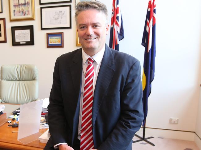 Mathias Cormann arriving at his office in Parliament House in Canberra after leaving the Senate Chamber.