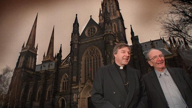 George Pell and his predecessor in the role, Archbishop Sir Frank Little, outside Melbourne’s St Patrick's Cathedral in 1996. 