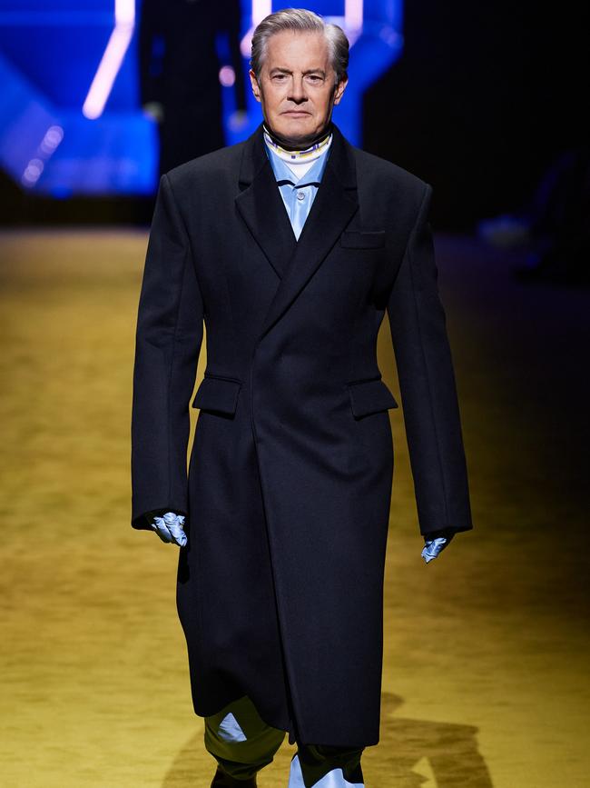 Kyle MacLachlan walking for Prada.