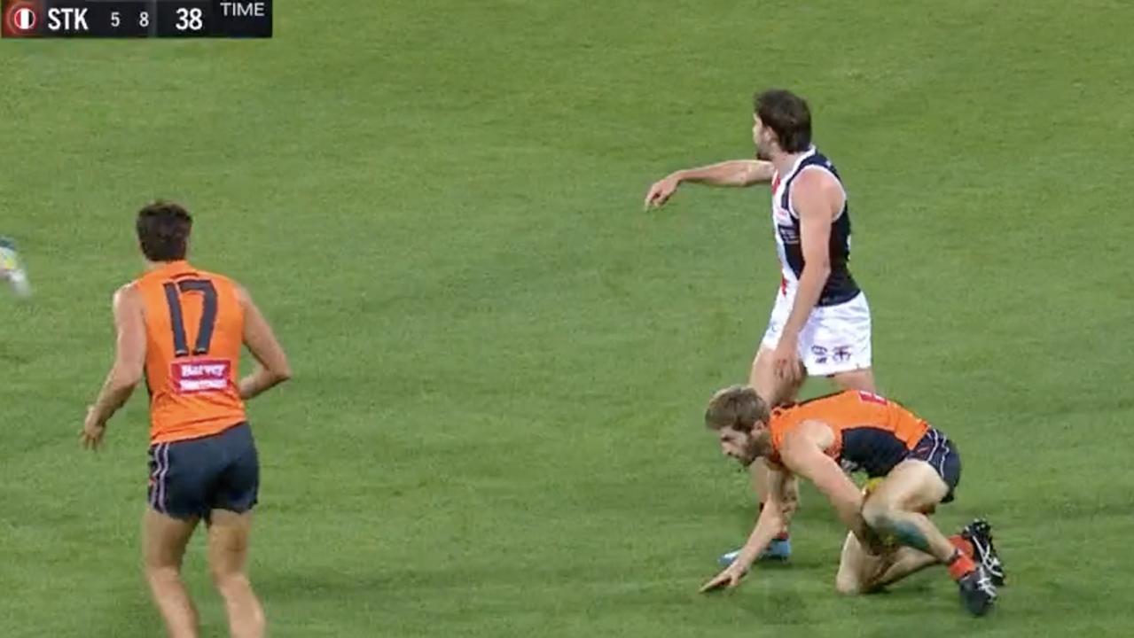 St Kilda's Daniel McKenzie disputes a mark paid to Giant Callan Ward in the second term, saying the ball hit the ground. A 50m penalty was paid for umpire dissent. Picture: Fox Footy