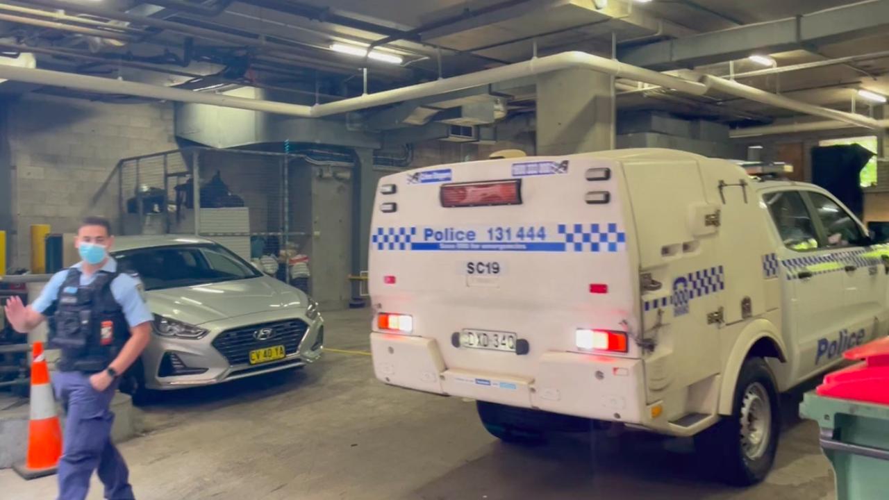 A police car believed to believed to be transporting Andrew O'Keefe in January.