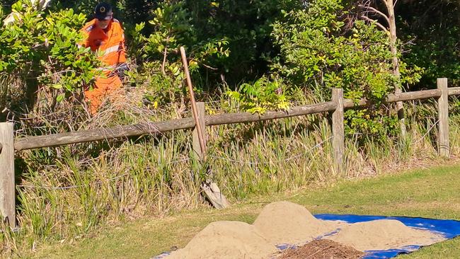 Forensic police spent a day sifting through sand for evidence. Picture: Toni Moon.