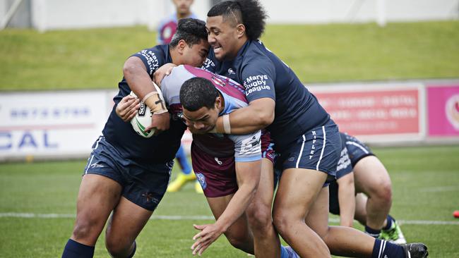 Lipoi Hoppi charges into the Chifley College defence. Picture: Adam Yip