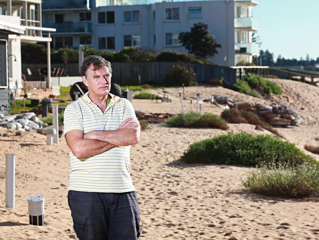 Garry Silk pictured a year on from the historic storm which swept away half the beachfront. Picture: Adam Yip.