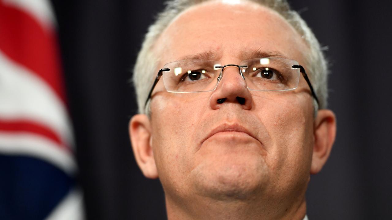 Prime Minister Scott Morrison has threatened to strip councils of their citizenship powers if they refuse to hold ceremonies on Australia Day. Picture: Getty Images