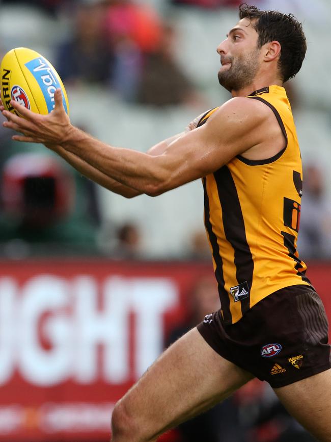 David Mirra marks running back with the flight against Melbourne. Picture: Michael Klein