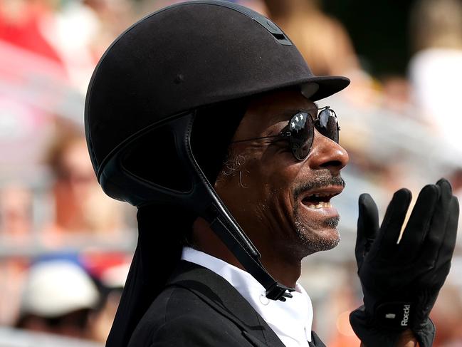 VERSAILLES, FRANCE - AUGUST 03: Snoop Dogg attends the Dressage Team Grand Prix Special on day eight of the Olympic Games Paris 2024 at Chateau de Versailles on August 03, 2024 in Versailles, France. (Photo by Mike Hewitt/Getty Images)