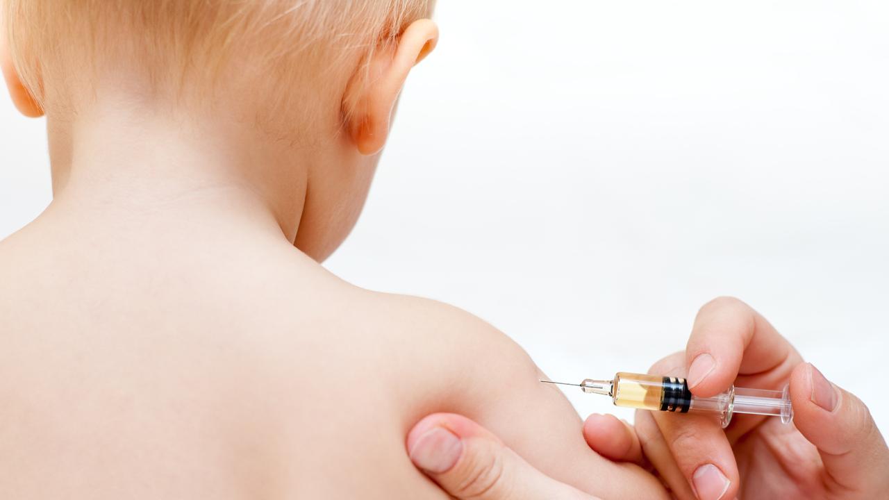 A baby gets an injection.