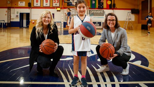 First, it was the Liberals … Rachel Swift and Anne Ruston with Olivia Pajkovski at the Marion Basketball Stadium on April 20. Picture: Matt Turner