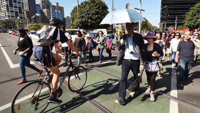 Pedestrians and cyclists are regularly on a collision course along Southbank Promenade. Picture: Robert Leeson