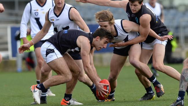 Billy Kanakis gathers the ball for the Ammos. Picture: Chris Eastman