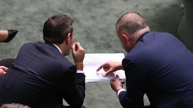 Back to the drawing board on tax cut package amendments? Shadow Treasurer Jim Chalmers (left) and Opposition Leader Anthony Albanese get together in Parliament House yesterday. Picture: Kym Smith