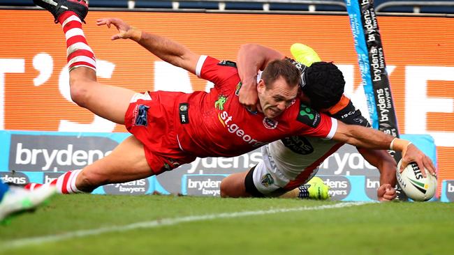Jason Nightingale scores his third try for the Dragons against Wests Tigers. Picture: Gregg Porteous