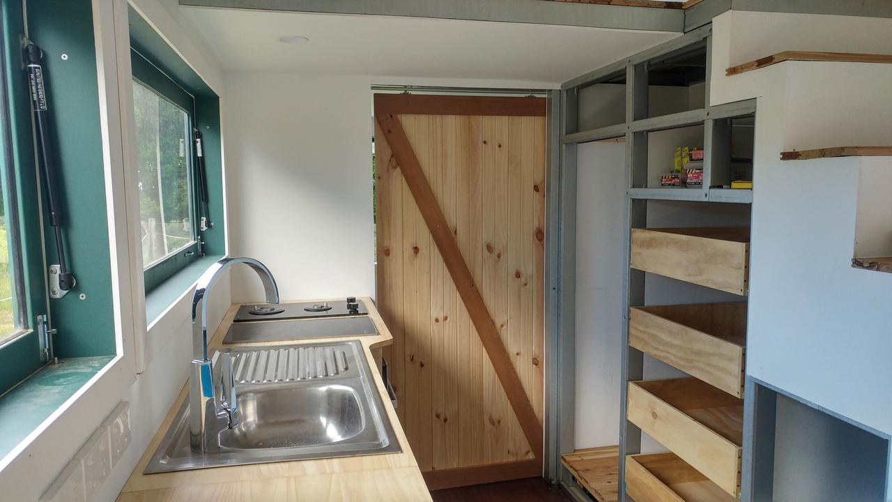 Their tiny home has a compact kitchen to match. Picture: Media Drum World/Australscope 