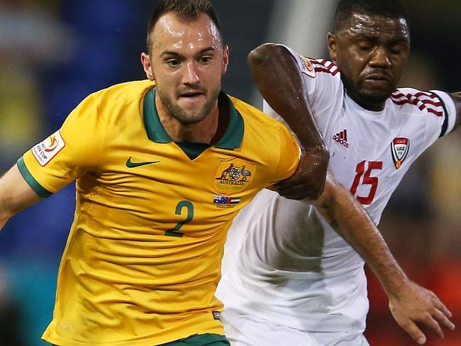 NEWCASTLE, AUSTRALIA - JANUARY 27: Ivan Franjic of Australia competes with Ismail Al of the United Arab Emirates during the Asian Cup Semi Final match between the Australian Socceroos and the United Arab Emirates at Hunter Stadium on January 27, 2015 in Newcastle, Australia. (Photo by Brendon Thorne/Getty Images)