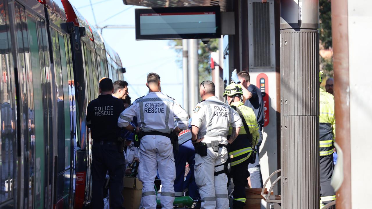 The man, believed to be aged in his 40s, was found under the carriage. Picture: NewsWire / Nicholas Eagar