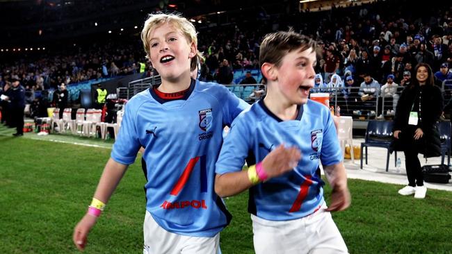 Sussex Inlet Public School duo Beau McDowall (left) and Matt Donaldson celebrating a try. Picture: Supplied