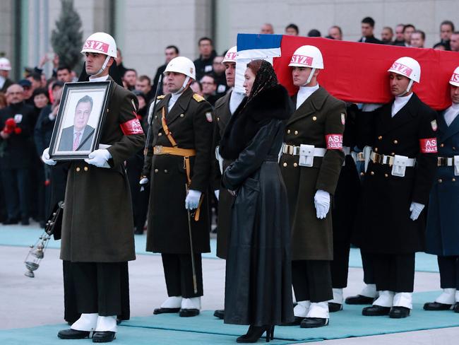 Members of a Turkish forces honour guard carry the Russian flag-draped coffin of late Russian ambassador to Turkey Andrey Karlov. Picture: AFP/Adem Altan