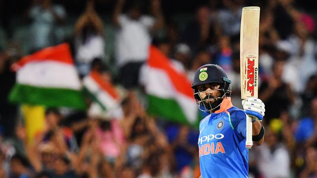 ADELAIDE, AUSTRALIA - JANUARY 15: Virat Kohli of India celebrates after reaching his century during game two of the One Day International series between Australia and India at Adelaide Oval on January 15, 2019 in Adelaide, Australia. (Photo by Daniel Kalisz/Getty Images)