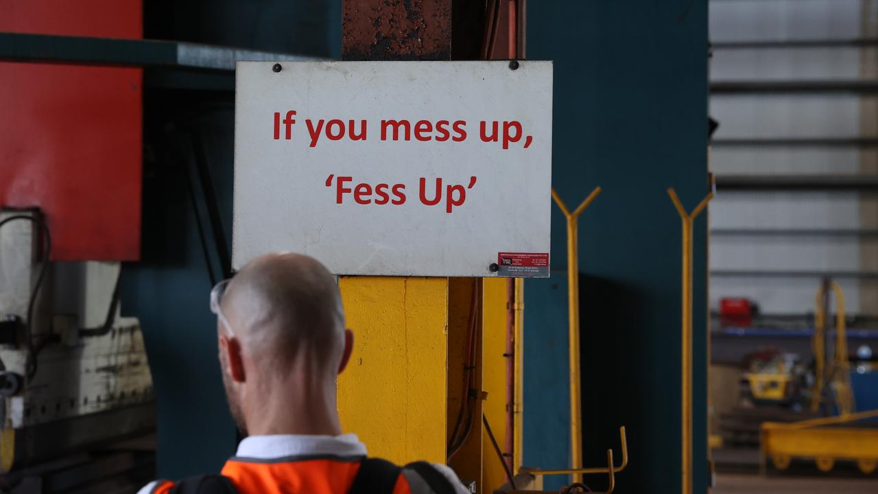 Staff covered up this sign before the Prime Minister arrived. Picture: Jason Edwards