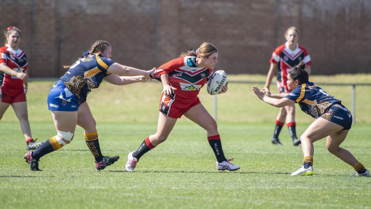 Mariah Brown (right) prepares to make a tackle in the TJRL U17s 2021 grand final. Picture: Nev Madsen