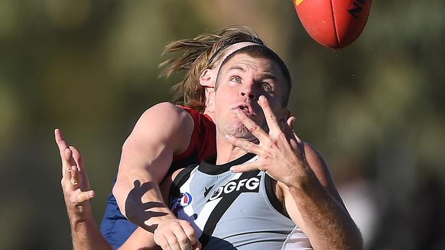 Dan Houston tries to juggle a mark. Picture: Felicity Elliott/AFL Photos via Getty Images