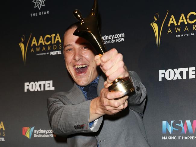 Samuel Johnson poses in the media room after winning the AACTA Award for Best Lead Actor in a Television Drama. Picture: Caroline McCredie/Getty