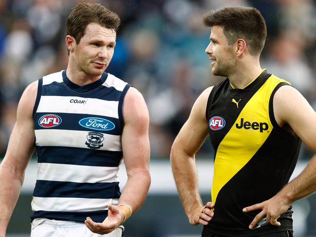 GEELONG, AUSTRALIA - AUGUST 12: Patrick Dangerfield of the Cats chats to Trent Cotchin of the Tigers during the 2017 AFL round 21 match between the Geelong Cats and the Richmond Tigers at Simonds Stadium on August 12, 2017 in Geelong, Australia. (Photo by Adam Trafford/AFL Media/Getty Images)