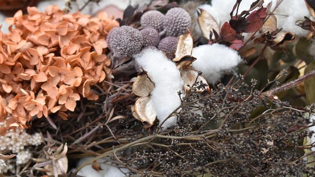 Working with a variety of flowers business owner Emma Stegman said she enjoys everything from banksias and eucalyptus leaves to lotus pods and cotton. Picture: Rhylea Millar