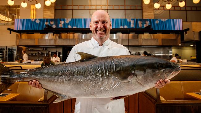 Executive Chef Tony Carroll with a wild Kingfish at Fishbank. Picture: Matt Turner.