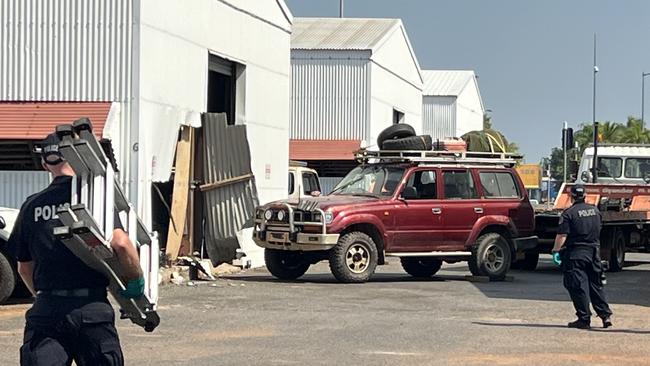 A 4WD with significant damage to its windscreen and front could be seen next to the damaged building at Yarrawonga. Picture: Harry Brill.