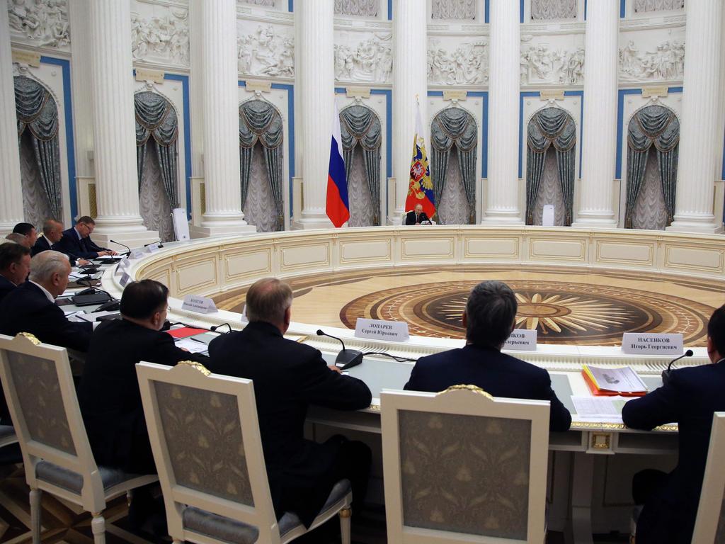 Russian President Vladimir Putin chairs a meeting with leadership of military-industrial complex enterprises at the Kremlin in Moscow.