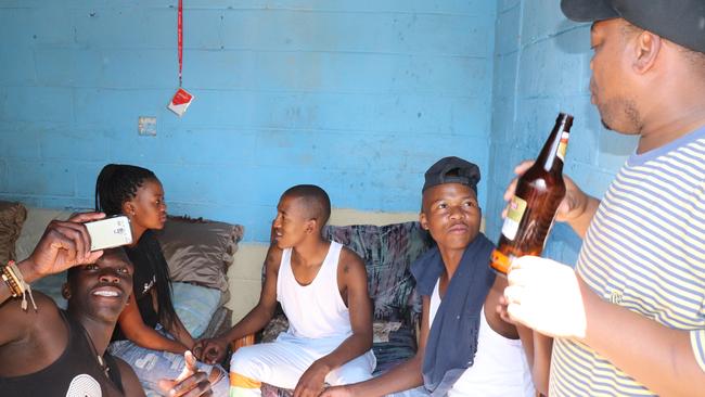 A group of friends enjoys a Sunday session in Langa, South Africa. Picture: Megan Palin.