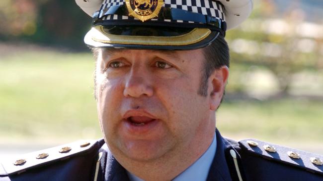 Police Inspector Paul Reynolds talks to the media about the trapped miners at Beaconsfield Gold Mine, about 40km north-west of Launceston in Tasmania, Wednesday, April 26, 2006. Grave fears are held for the safety of three miners at the mine who have not been heard from since an earthquake triggered a rockfall about 9.30pm (AEST) last night. The men were working about a kilometre underground when the rockfall happened. (AAP Image/Dale Cumming) NO ARCHIVING