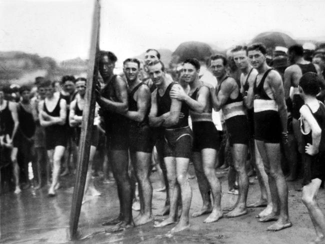 Duke Kahanamoku with bathers in Sydney in 1915. Picture: Supplied