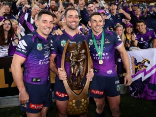 Cooper Cronk, Cameron Smith and Billy Slater after winning the 2017 NRL Grand Final.  (Photo by Cameron Spencer/Getty Images)