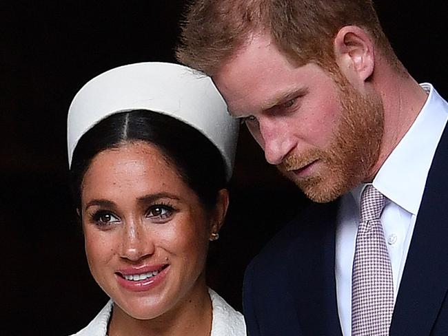 (FILES) In this file photo taken on March 11, 2019 Britain's Prince Harry, Duke of Sussex (R) and Meghan, Duchess of Sussex leave after attending a Commonwealth Day Service at Westminster Abbey in central London. - Talk about being born with a silver spoon in your mouth: the royal baby of Prince Harry and Meghan Markle will have a particularly glittery one. And US tax authorities will be keen to know how much that utensil is worth. That's because the baby will have dual nationality: British because of his father and US from his American mother, whose official title is the duchess of Sussex. US nationality comes with a bevy of restrictive conditions: like any American who is born, grows up and dies anywhere in the world, year after year Meghan and Harry's child will have to show the Internal Revenue Service his or her tax status is clean. (Photo by Ben STANSALL / AFP)