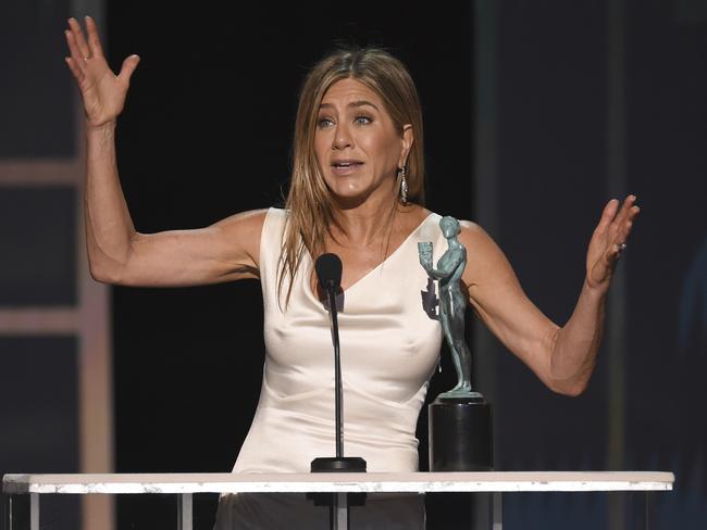 She was shocked! Jennifer Aniston accepts the award for outstanding performance by a female actor in a drama series for The Morning Show. Picture: Invision