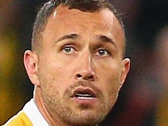 BRISBANE, AUSTRALIA - JULY 18: Quade Cooper of the Wallabies runs the ball during The Rugby Championship match between the Australian Wallabies and the South Africa Springboks at Suncorp Stadium on July 18, 2015 in Brisbane, Australia. (Photo by Cameron Spencer/Getty Images)