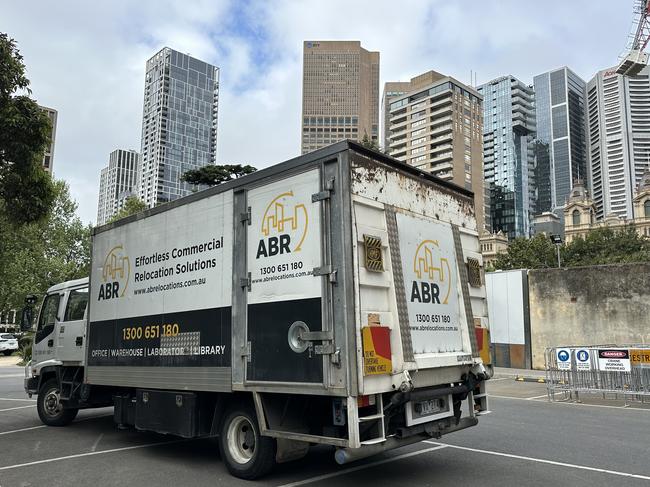 A removalist truck has arrived at Spring St ahead of Daniel Andrews' departure from office.