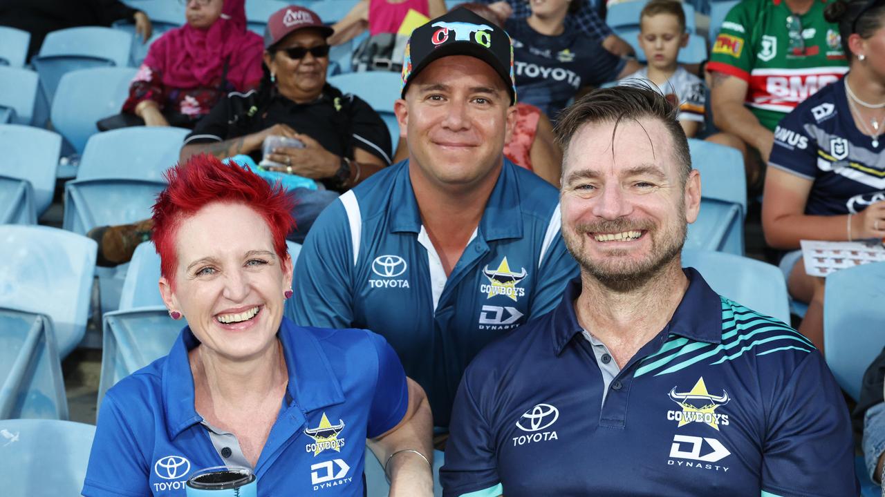 Sammi Towne, Rob Baines and Andy Towne cheer on the Cowboys in the NRL preseason match between the North Queensland Cowboys and the Dolphins, held at Barlow Park. Picture: Brendan Radke