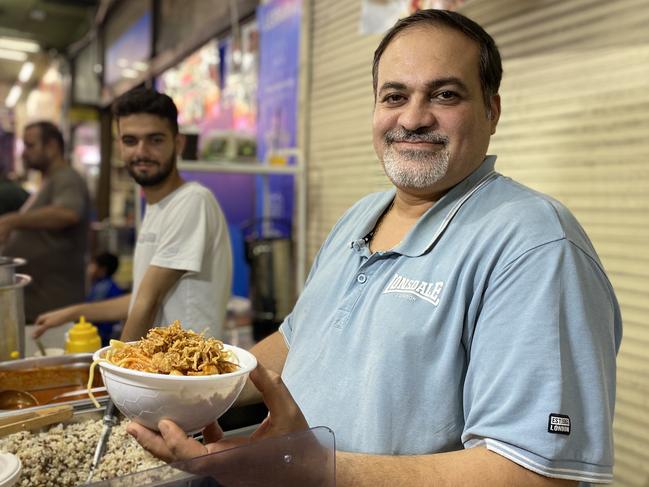 Adel Ayad selling Egypt’s national dish, koshary at the Ramadan Night Markets. Picture: Kirsten Jelinek.