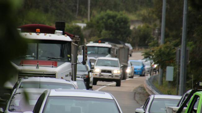 Coomera MP Michael Crandon took these photographs of Exit 49 on the Pacific Motorway to show dangerous overcrowding on the ramps at peak hour.