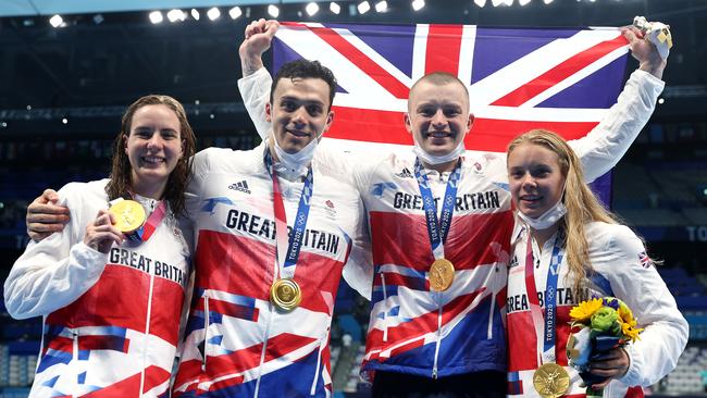 Gold medallists Kathleen Dawson, Adam Peaty, James Guy, Anna Hopkin and of Team Great Britain won gold in the Mixed 4 x 100m Medley Relay Final in Tokyo. Photo by Clive Rose/Getty Images)