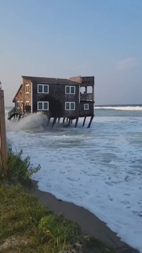 Beachfront home collapses into ocean