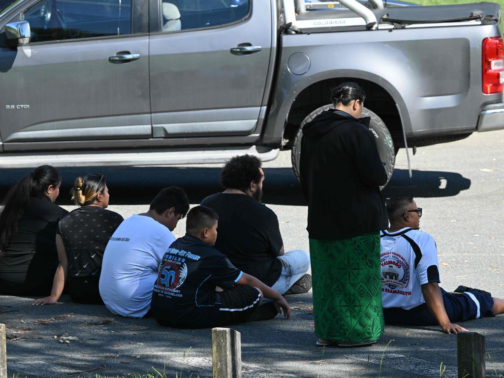 Watched by friends and family sat by the river anxiously. Picture: Lyndon Mechielsen/Courier Mail