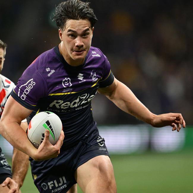 Jack Howarth of the Storm runs the ball during the NRL Preliminary Final match between the Melbourne Storm and Sydney Roosters last year.